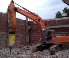 Аренда гусеничного экскаватора с гидромолотом